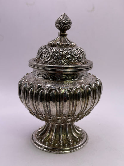 A vintage silver pot - bumpa