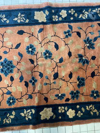 An antique handwoven Chinese rug