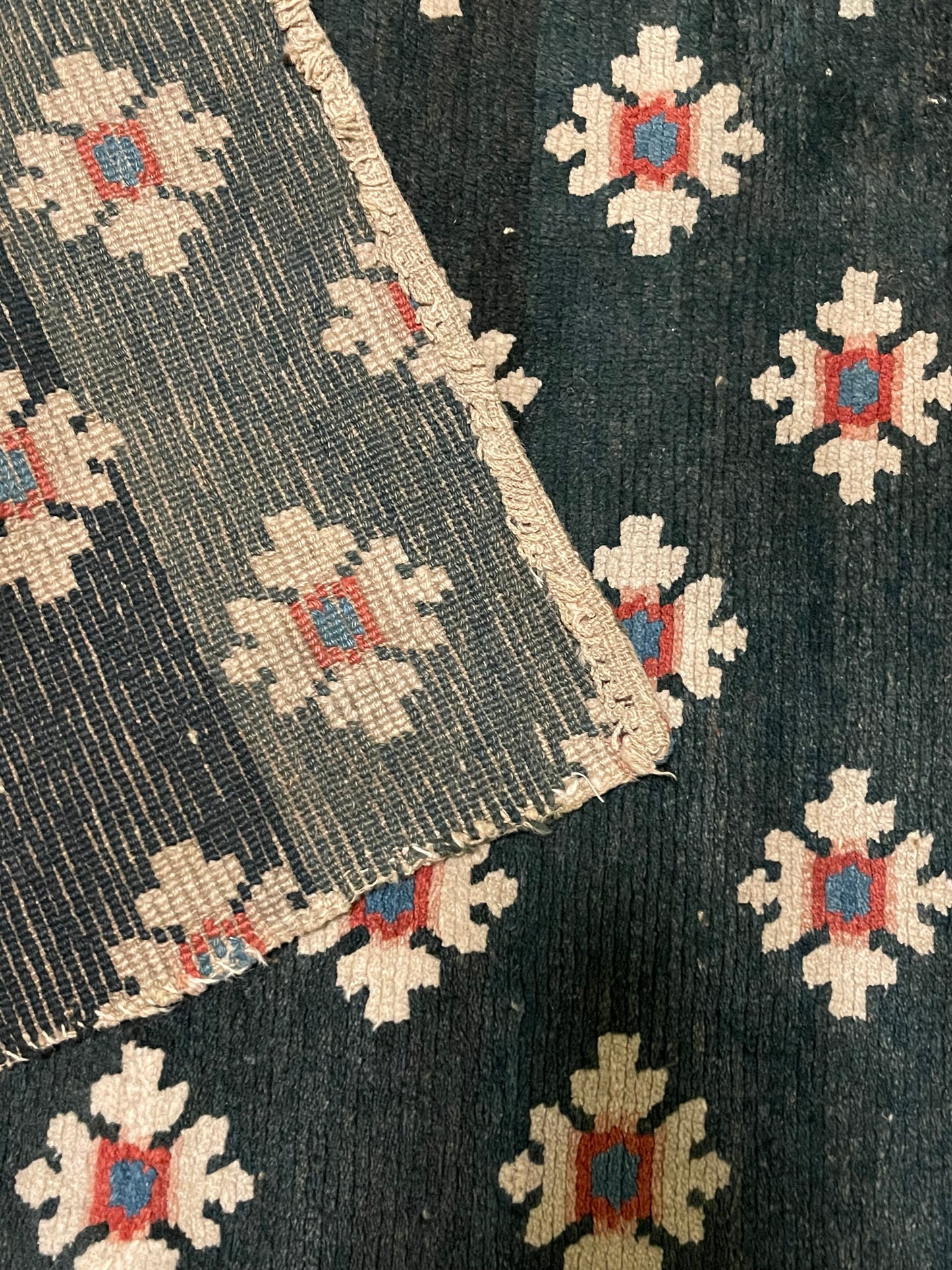 An antique Tibetan handmade wool  rug