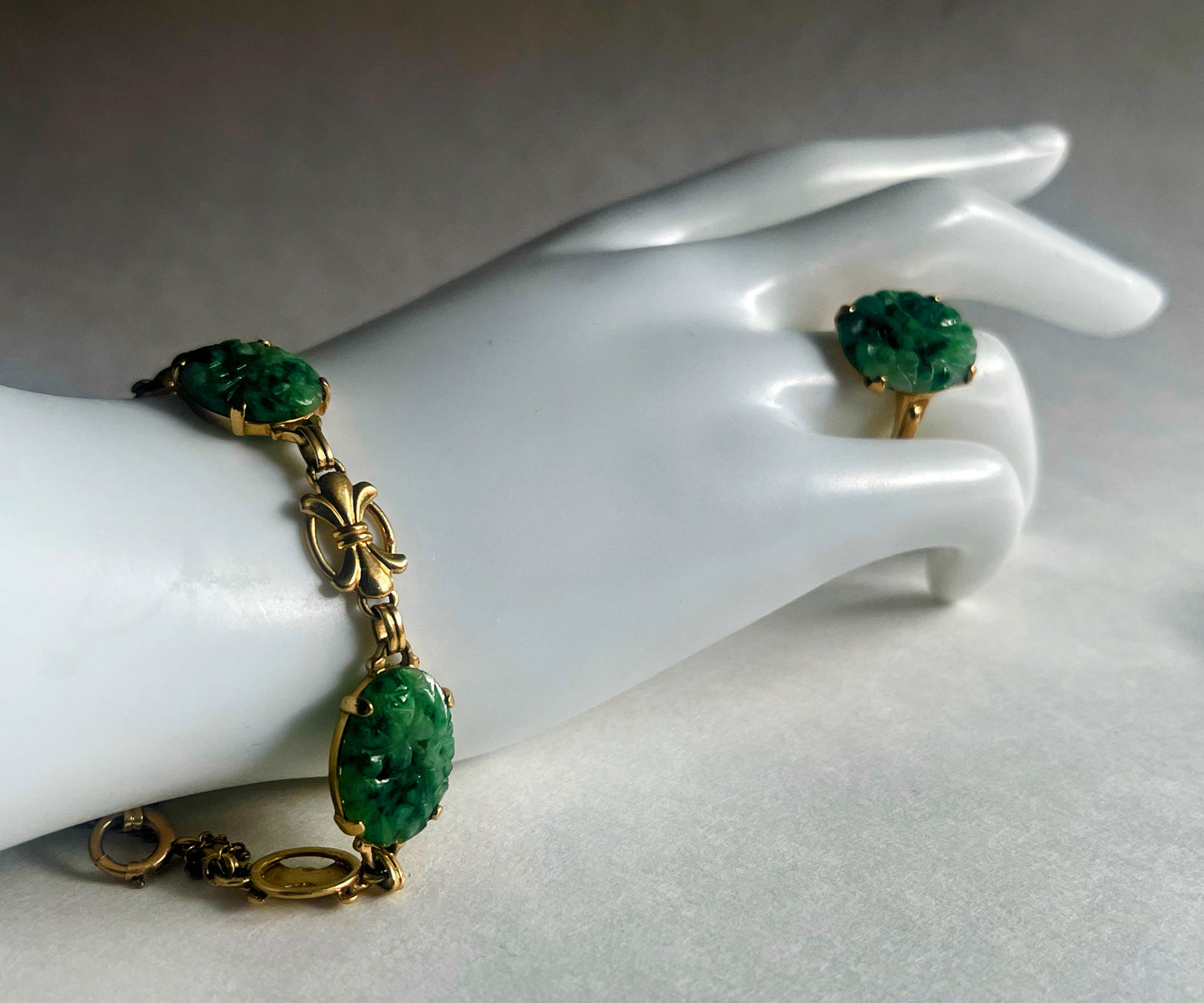 A 14kt gold and jade jewelry set