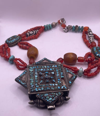 Antique ghau with coral and silver bead necklace